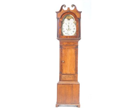 A late 18th early 19th Century oak and mahogany crossbanded longcase clockHaving a 12" painted dial enclosed by spandrels pai