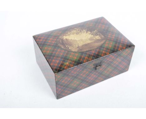 An early 20th Century tartan jewellery boxThe hinged cover centred with an oval black and white print of a street scene, encl