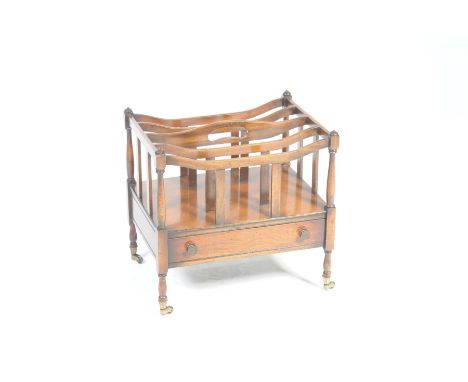 A reproduction Georgian style mahogany Canterbury by Longdale Reproductions, LondonThe central rail with a kidney shaped aper
