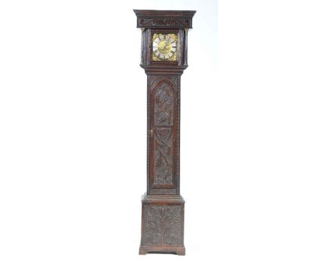 An 18th Century carved oak single hand longcase clock by Jonas Barber, Bouldan BridgeThe 8" brass dial with a silvered chapte