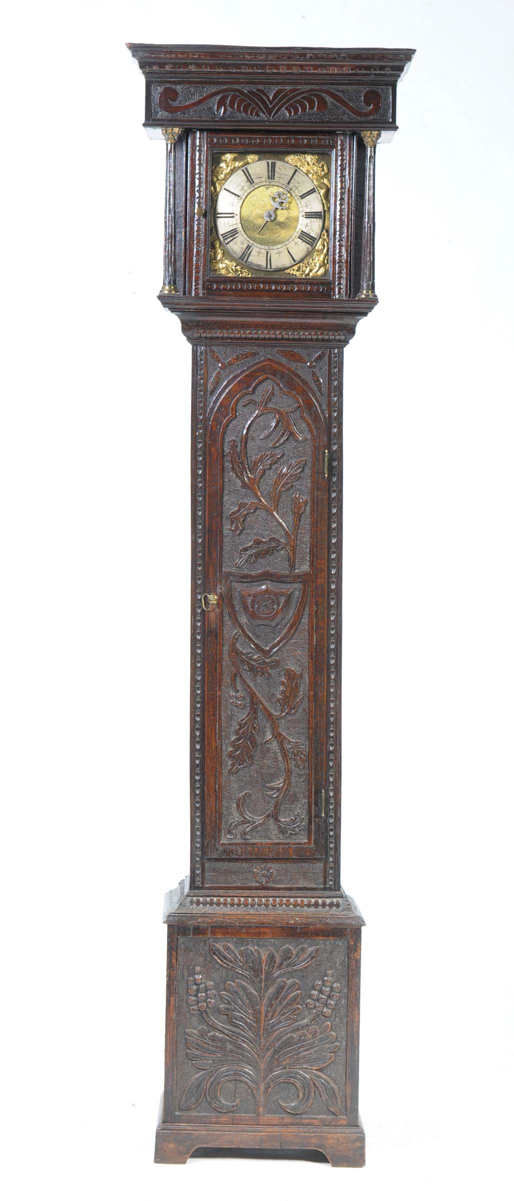An 18th Century carved oak single hand longcase clock by Jonas Barber, Bouldan BridgeThe 8" brass