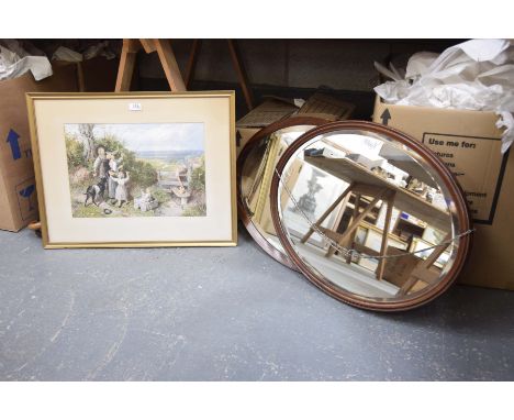 A coloured print and two oval mahogany framed wall mirrorsThe print depicting children picking fruit with a goat, within a gi