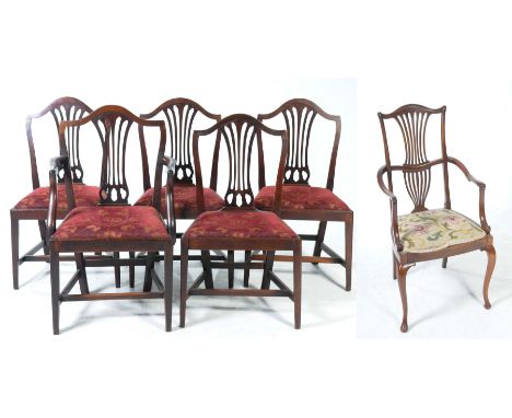 A set of five 19th Century Hepplewhite style dining chairsEach with an arched back and pierced splat above drop-in seats rais