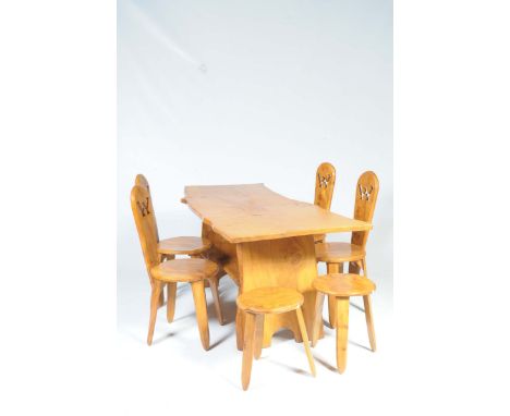 A rustic elm slab top kitchen table with four conforming chairs and stools by Daffodil DellThe table with a shaped slab top r