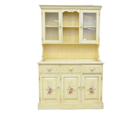 A modern painted pine kitchen dresserThe high back with a moulded cornice above a central open shelf flanked by two glazed do