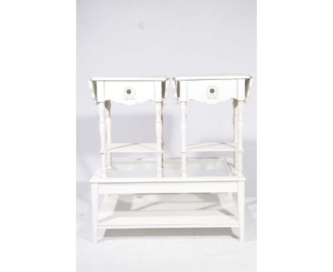 A pair of French style white side tables and a coffee tableThe side tables both with two drop leaves above a single frieze dr