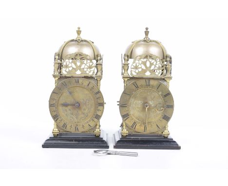 A 17th Century style brass lantern clock by Thomas Mudge, early 20th Century and a second similar clockThe clock of typical f