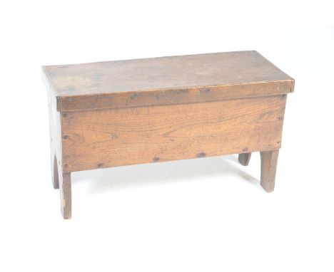An Unusual 18th Century elm six plank chest of small proportions With a rectangular detachable cover supported on V cut brack