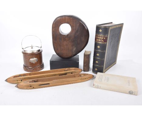 An unusual wooden carved ornament in the manner of Dame Barbara Hepworth, mid-20th centuryThe wooden boulder shaped ornament 