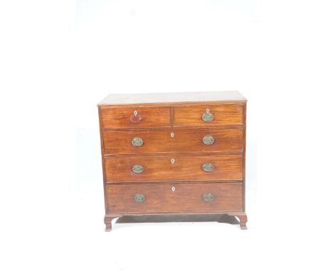 An early 19th Century mahogany chest of drawersThe rectangular moulded top above two short, three long graduated cockbeaded d