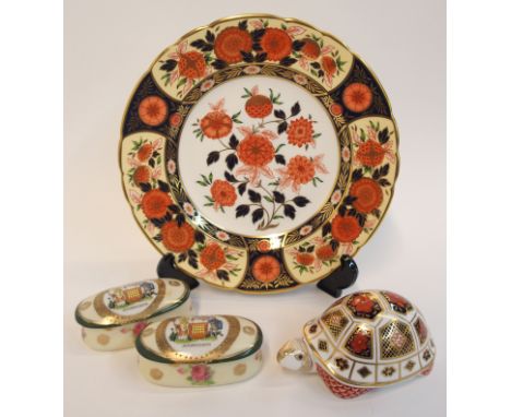 A Royal Crown Derby Antique Chrysanthemum plate, a tortoise paperweight and two Arbroath crested trinket pots (4)  Condition 
