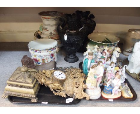 A gilt metal mantel clock, EPNS cigarette box, various porcelain and bisque figures, two pottery basins, pair of black vases,