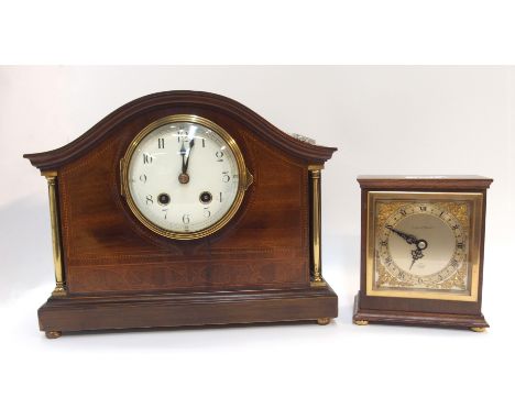 An Edwardian mahogany cased mantel clock with inlaid decoration, 23.5cm high and an Elliot clock retailed by Mappin &amp; Web