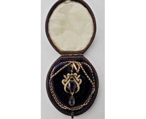 A 15ct gold amethyst and pearl Edwardian pendant with a 9ctgold vintage chain  Condition Report: 