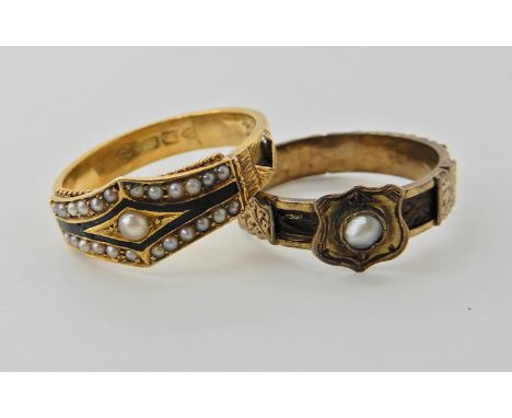 A 15ct gold black enamel and pearl mourning ring finger size R1/2, and another yellow metal pearl mourning ring, finger size 