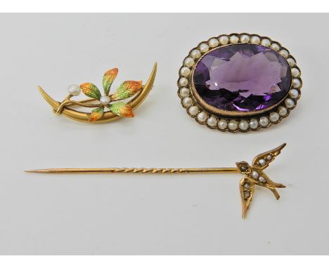 A 9ct gold amethyst and pearl brooch, a pearl and enamel brooch (af) and a 9ct pearl set swallow pin  Condition Report: 