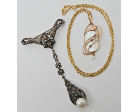 A 15ct gold chain with an Art Nouveau mother of pearl pendant and a vintage white metal pearl and marcasite brooch  Condition