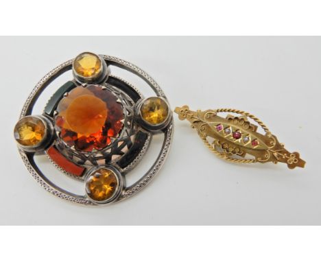 A Scottish agate and Cairngorm white metal brooch and a 9ct red gem and pearl brooch  Condition Report: 