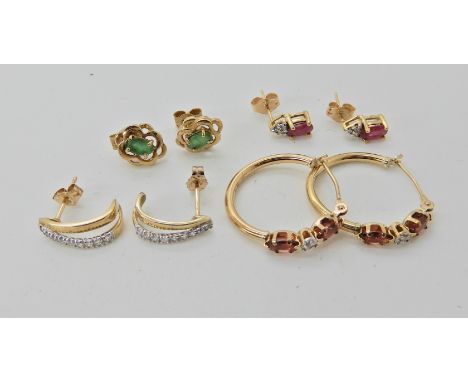 Three pairs of earrings to include diamond, ruby, emerald and garnets  Condition Report: 