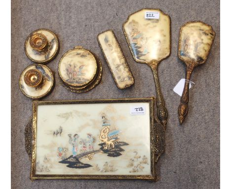 A vintage gilt metal dressing table set with pair of candlesticks, mirror, hair brush, clothes brush, powder dish and tray  C