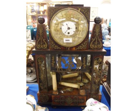 A French 19th century Empire style mantel clock, of architectural form, the wood case with gilt metal figural and foliate mou