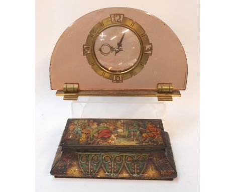 An Art Deco peach glass mantle clock and a biscuit tin  Condition Report: 