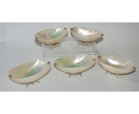 A set of five mother of pearl dishes and another (6)  Condition Report: 