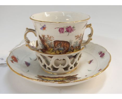 A 19th century KPM porcelain trembleuse chocolate cup, painted with hunting scenes (lacking cover and slight def) and a Frenc