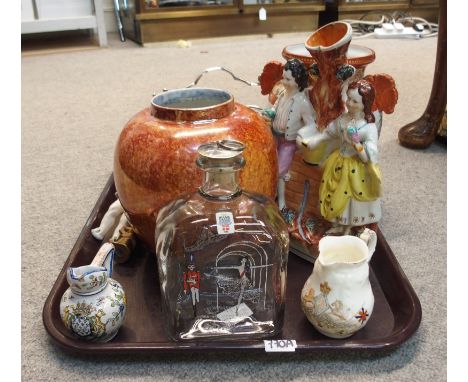 A Holmegaard Nutcracker glass decanter, Wilton Ware orange lustre jar, Staffordshire figure group, beaded purse, Arita jar et