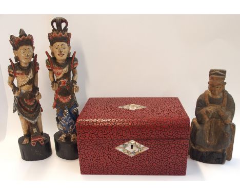 A Victorian jewellery box with mother of pearl inlaid escutcheons, together with three Eastern painted wooden figures (4)  Co