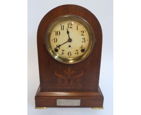 A Seth Thomas dome top mantle clock with inlaid decoration, 33cm high.  Condition Report: 