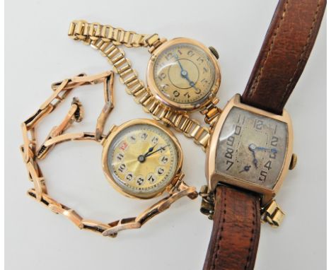 A 9ct gold ladies vintage watch, a 9ct ladies watch head and a 9ct cased gents watch head  Condition Report: 