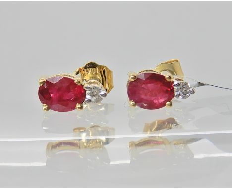 A pair of 9ct gold Burmese ruby and white zircon earrings with Gemporia Certificate new with tags  Condition Report: 