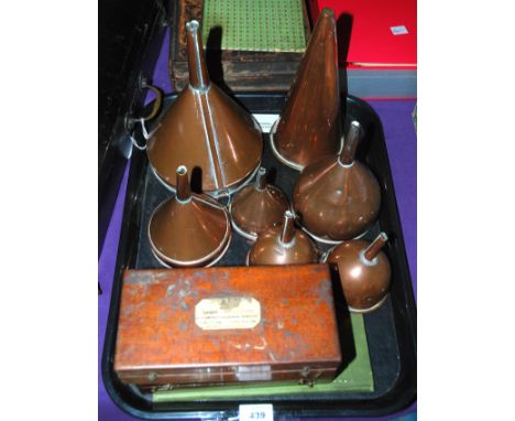 A collection of six cooper funnels, two cased Sikes hydrometers  Condition Report: 