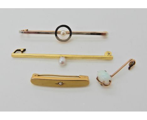 A 15ct pearl set brooch, a yellow metal example and two others (af)  Condition Report: 