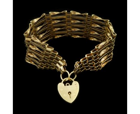 9ct gold seven bar gate bracelet, with heart locket clasp, hallmarkedCondition Report: Approx 16.65gm, length = 19cm, clasp s
