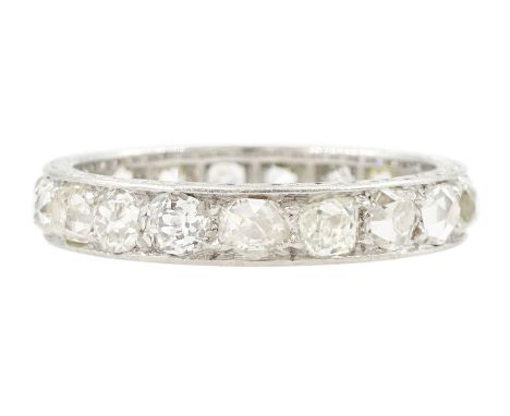 Early 20th century platinum old cut diamond full eternity ring, the sides with engraved decoration, total diamond weight appr