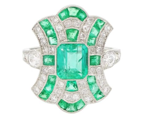 Platinum milgrain set emerald and diamond ring, octagonal cut emerald with calibre cut emerald and old cut diamond surround a