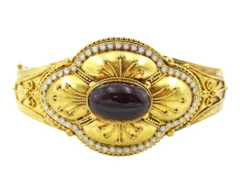 Victorian 15ct gold Etruscan revival gold cabochon garnet and white enamel hinged bangle, with applied wirework decoration, i