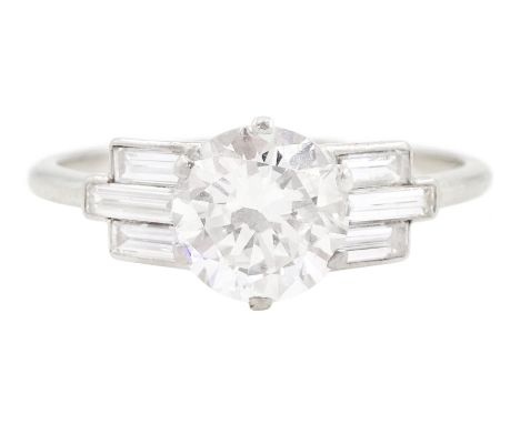 Art Deco platinum single stone transitional cut diamond ring, each side set with three baguette cut diamonds, stamped Plat, p