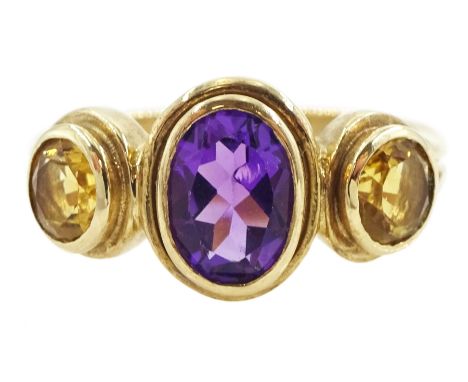 9ct gold bezel set three stone, oval cut amethyst and round cut citrine ring, hallmarkedCondition Report:Approx 4.95gm, size 