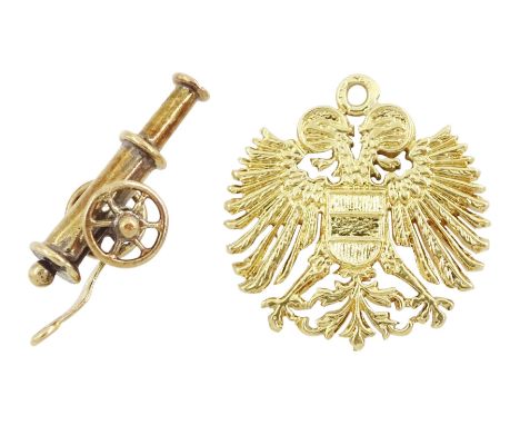 20ct cannon pendant / charm and a 14ct gold double headed eagle pendantCondition Report:20ct approx 1.55gm, length = 23mm, 14