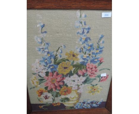 A 1920's floral tapestry in oak picture frame