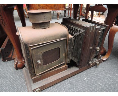 A vintage magic lantern of large traditional design
