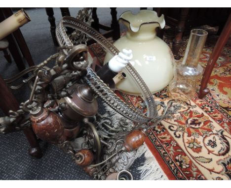 A late 20th century Dutch style ceiling light having floral decoration and treen mounts