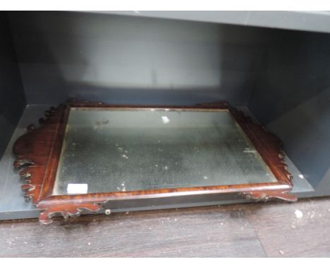 A 19th century mahogany frame wall mirror in the Chippendale style