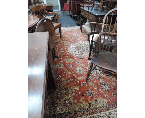 A Schah Abbas carpet square having floral decoration on russet ground