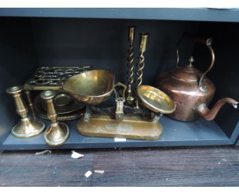 A selection of vintage copper and brassware including kettle, trivet, candlesticks, scales etc