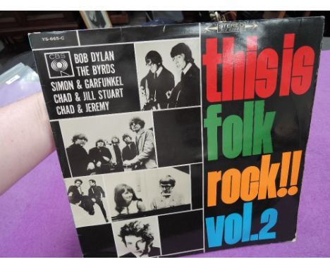A vinyl LP record, This is Folk Volume 2, Japanese , CBS Matrix number YS-665-C includes Simon & Garfunkel, Bob Dylan, Chad a