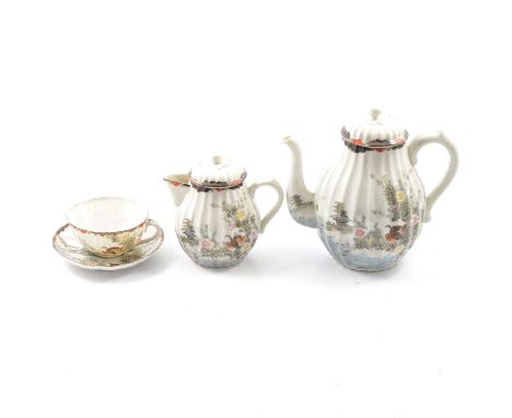 A Japanese eggshell type porcelain tea service, red three character mark to base, comprising teapots, cups, saucers, plates.